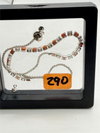 Women's silver-tone bolo tennis bracelet with orange and clear crystals, stylish jewelry by Republic Mercantile.