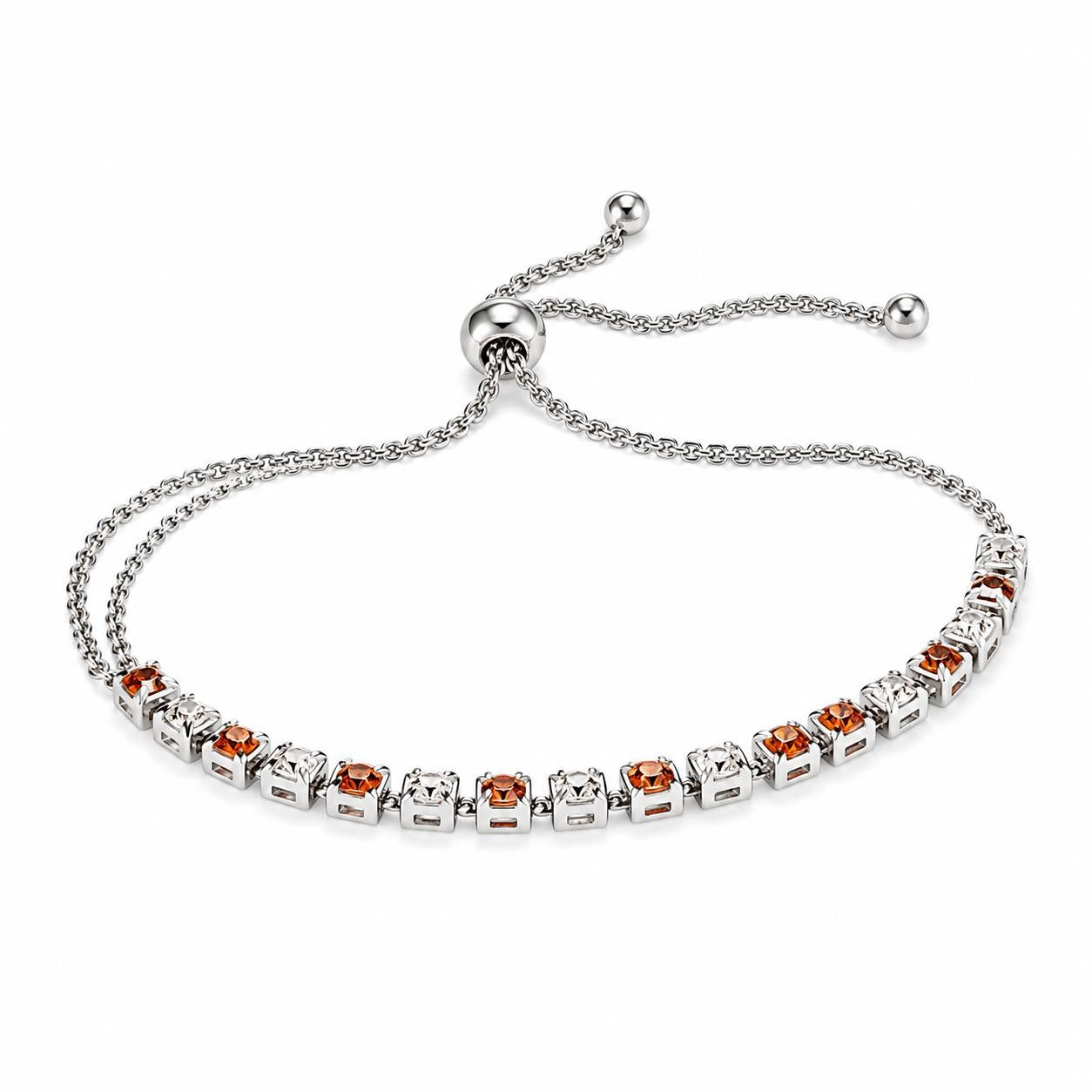 Silver-tone women's bolo tennis bracelet with orange and clear crystals, featuring a sleek and elegant design.