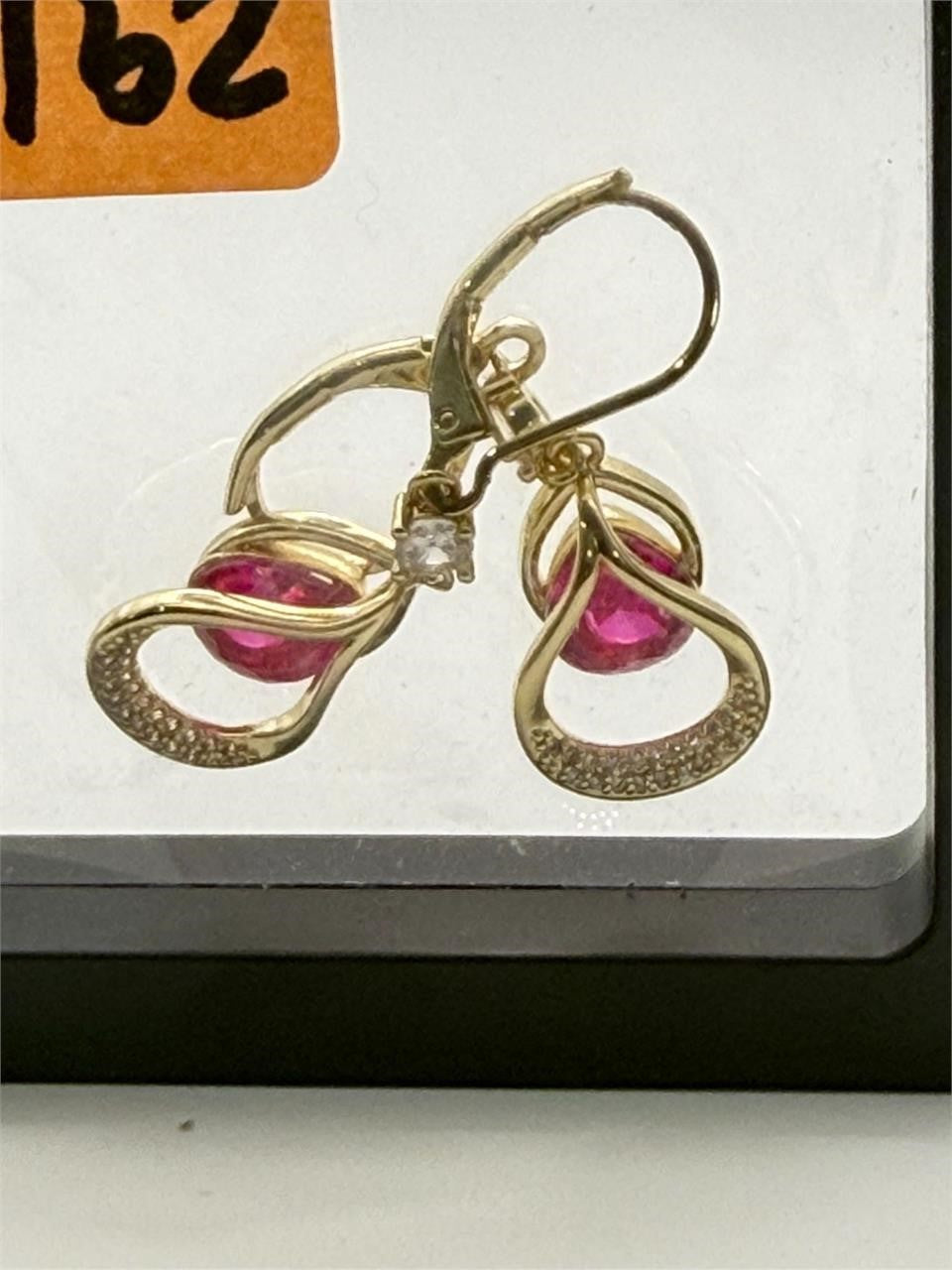 Pink teardrop gemstone earrings with 14k gold-plated hooks from Republic Mercantile, showcasing elegant jewelry design.