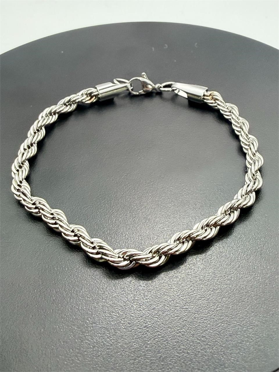 Men's silver-toned chain bracelet with a sleek design, featuring interlinked metal links, by Republic Mercantile.