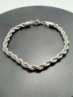 Men's silver-toned chain bracelet with a sleek design, featuring interlinked metal links, by Republic Mercantile.