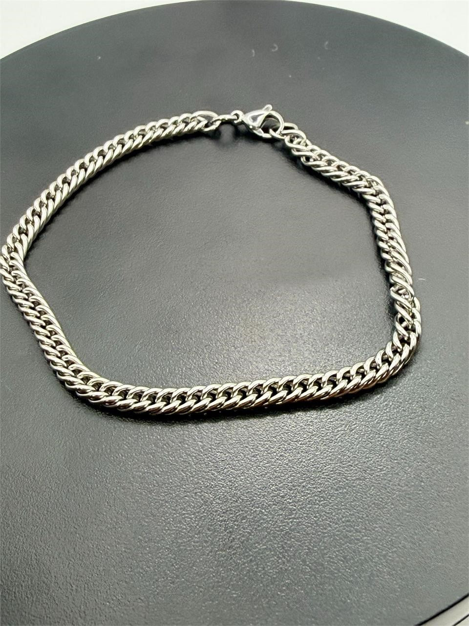 Men's silver toned chain bracelet with sleek links, stylish jewelry accessory from Republic Mercantile.