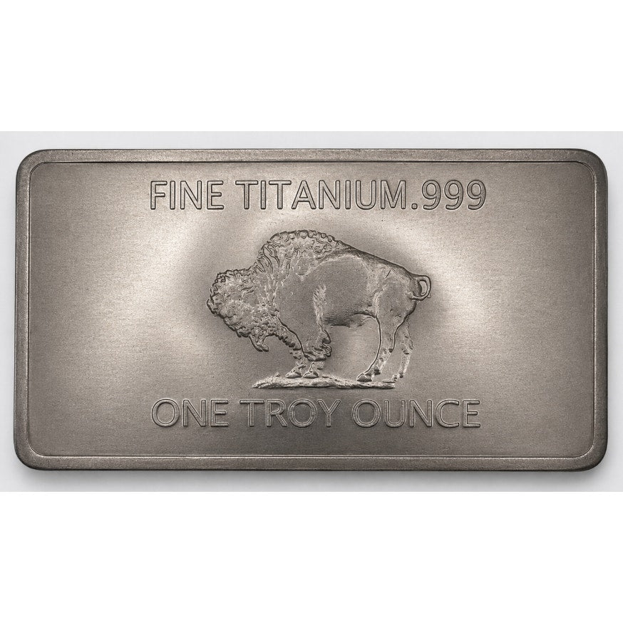 Close-up of a 1 oz .999 fine titanium collectible bar by CMC Mint, showing the textured surface and engraved details.