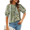 Prettygarden women's green floral short-sleeve blouse with a relaxed fit, featuring a feminine floral print and V-neck design.