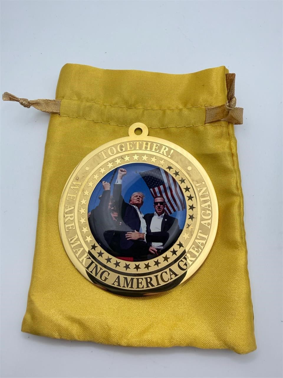 Reverse medallion featuring a Trump fight-president portrait by Republic Mercantile, showcasing detailed presidential design.
