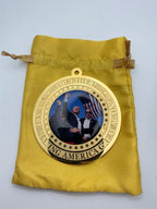 Reverse medallion featuring a Trump fight-president portrait by Republic Mercantile, showcasing detailed presidential design.