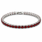 Red crystal silver-tone fashion bracelet with clasp lock, stylish jewelry piece featuring sparkling red stones and elegant silver finish.