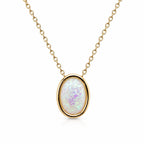 Iridescent opal-style oval pendant necklace with silver chain from Republic Mercantile, showcasing a shimmering, colorful gemstone pendant.