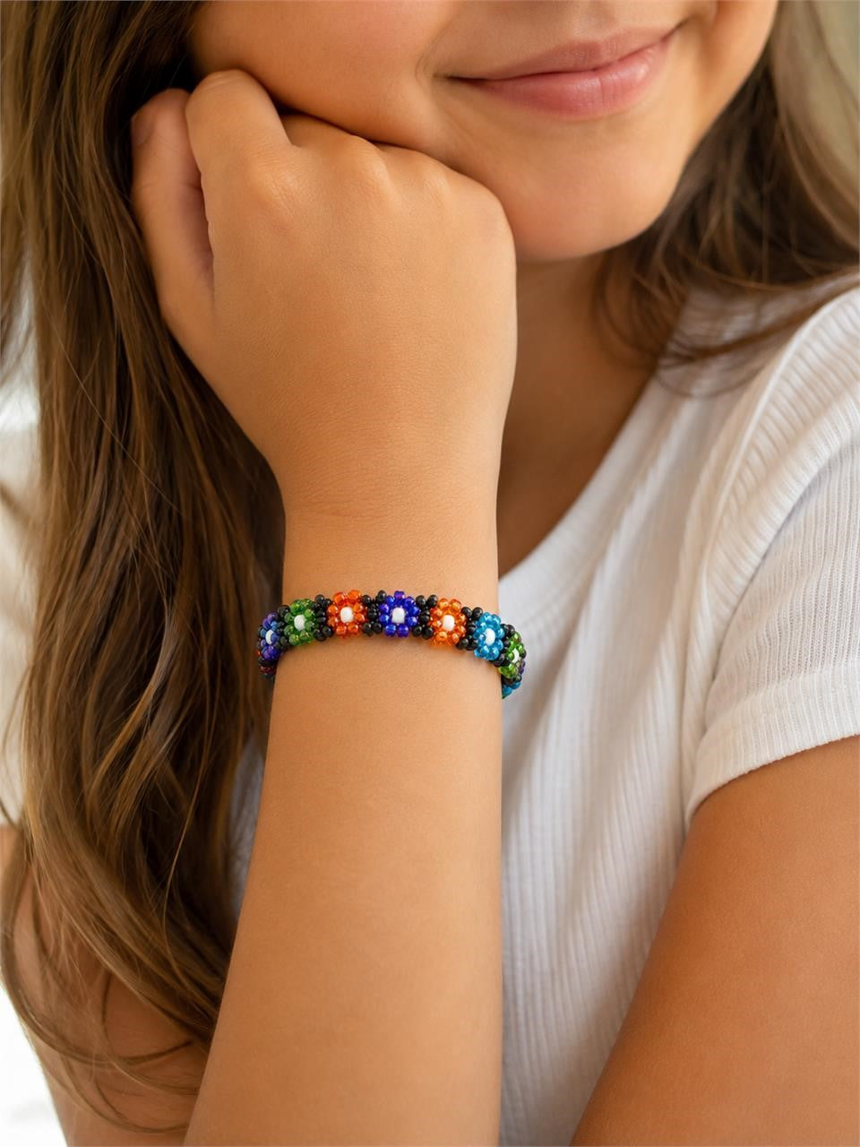 Peruvian beaded elastic floral bracelet with colorful beads and floral design, crafted by Republic Mercantile.