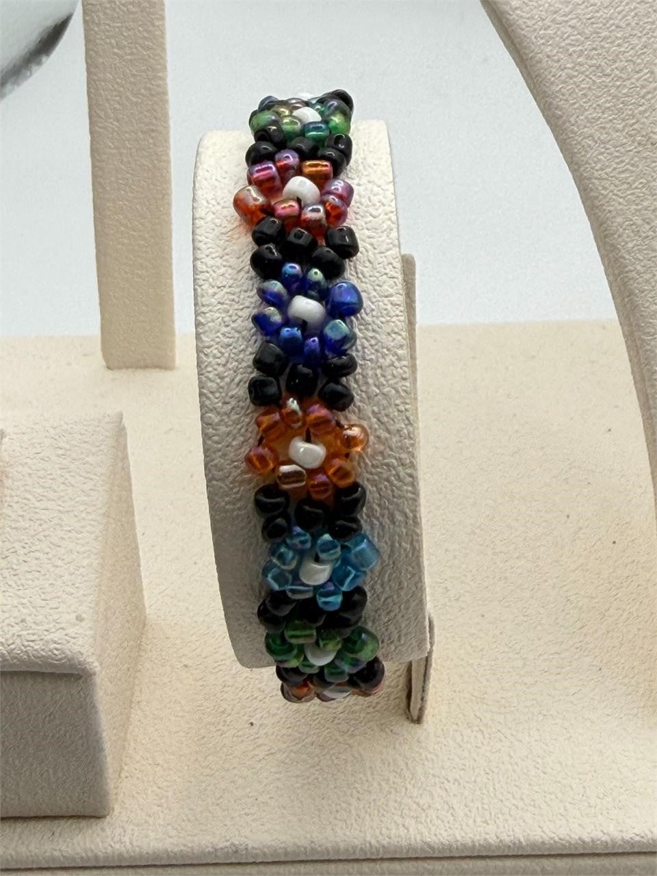 Peruvian beaded floral elastic bracelet by Republic Mercantile featuring colorful bead and floral design.