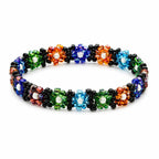 Peruvian beaded elastic floral bracelet with colorful beads, crafted by Republic Mercantile, featuring vibrant flower-themed design.