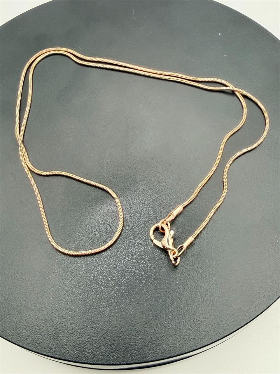 Rose gold 20-inch chain necklace from Republic Mercantile with a delicate, shiny link design.