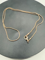 Rose gold 20-inch chain necklace from Republic Mercantile with a delicate, shiny link design.