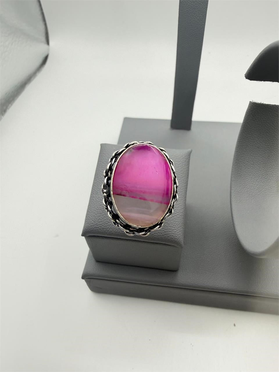 Sterling silver ring with pink banded agate stone, size 5.75, from Republic Mercantile, showcasing detailed silver setting and vibrant stone.