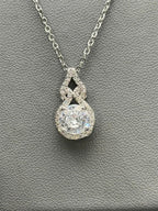 Gorgeous Moissanite pendant necklace with sparkling stone and silver chain, elegant jewelry from Republic Mercantile.