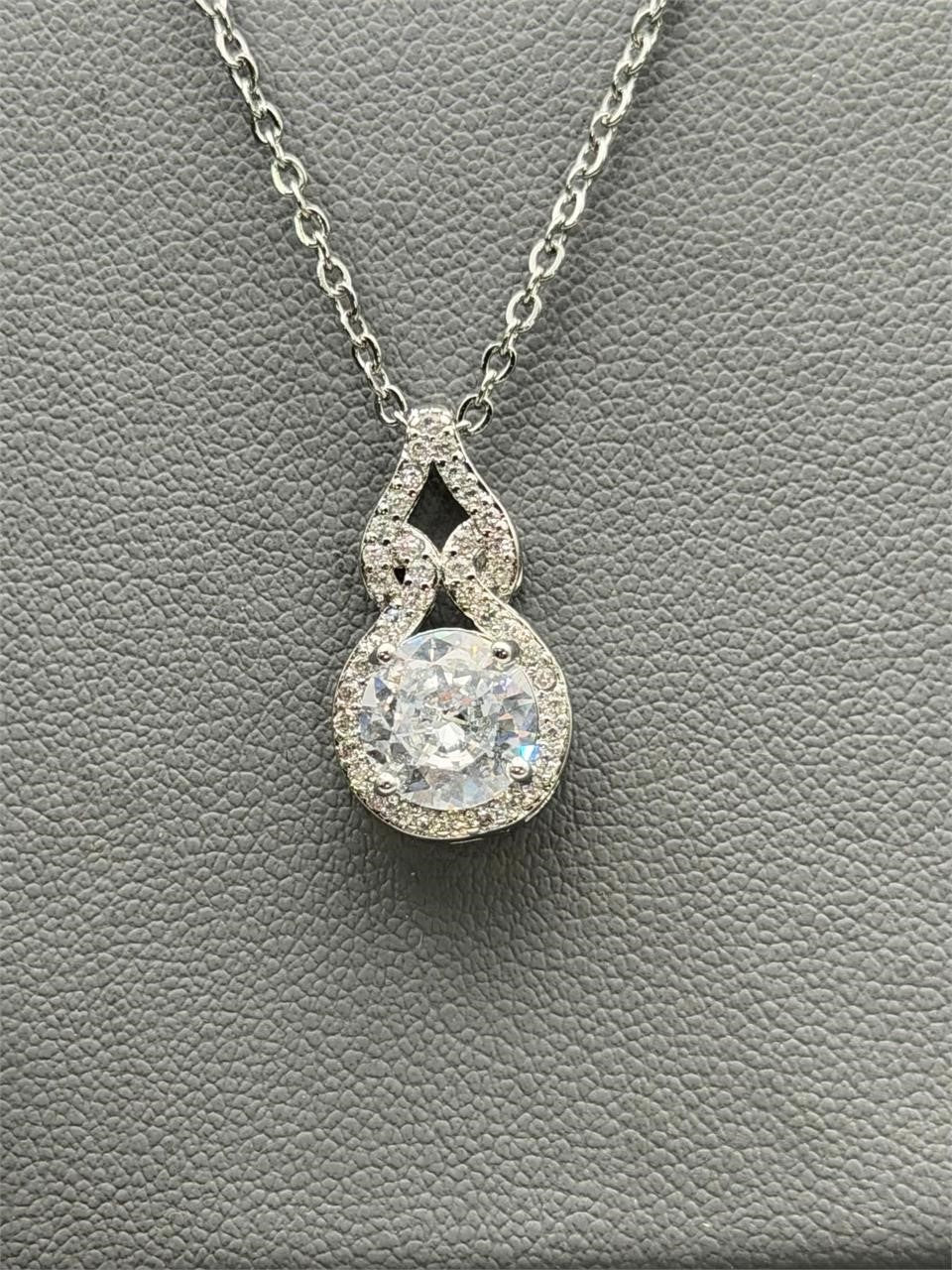 Gorgeous Moissanite pendant necklace with sparkling stone and silver chain, elegant jewelry from Republic Mercantile.