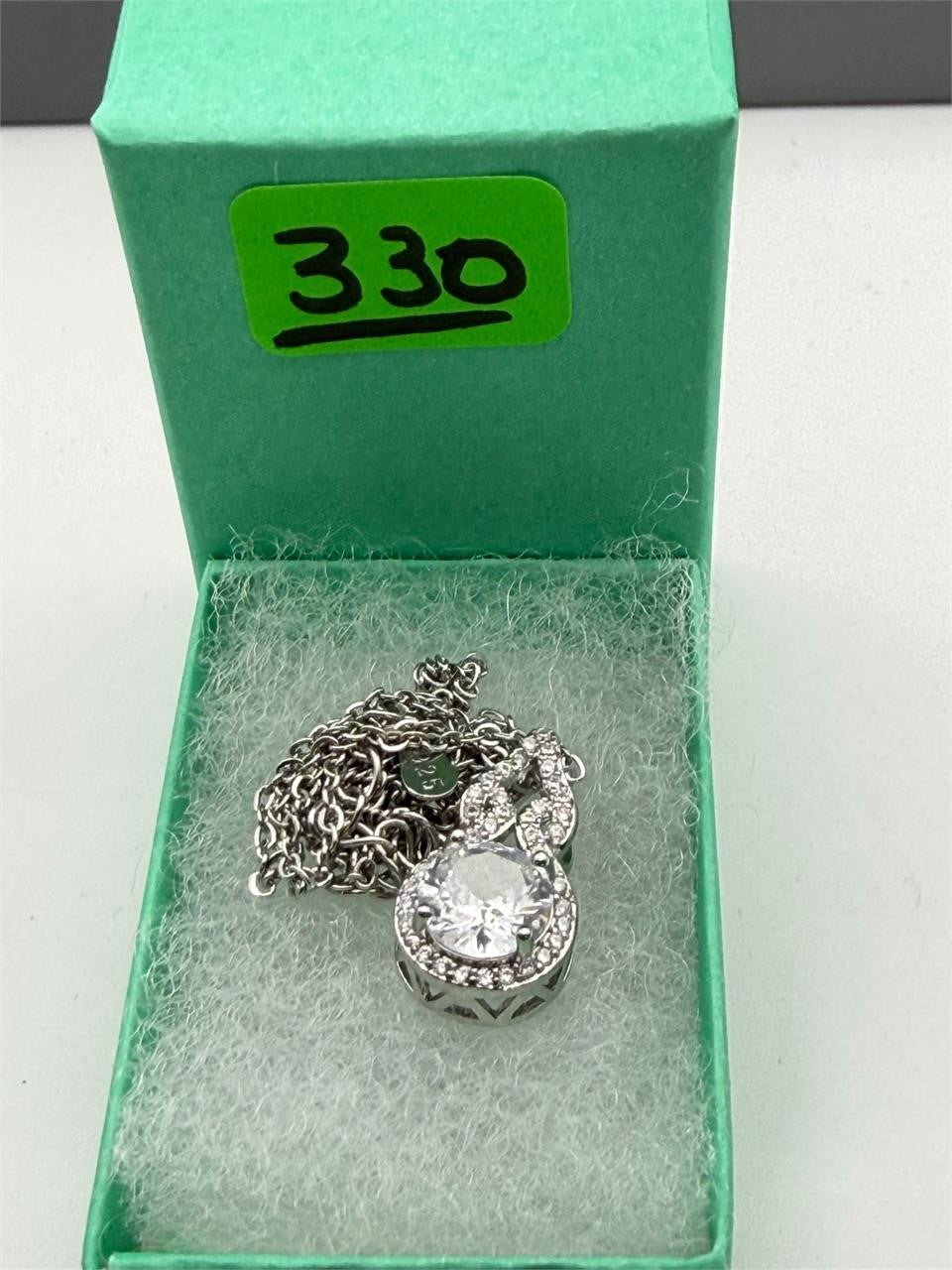 Gorgeous moissanite pendant necklace with sparkling stone on a delicate chain, from Republic Mercantile.