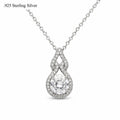 Gorgeous moissanite pendant necklace with sparkling gemstone on silver chain, elegant jewelry by Republic Mercantile