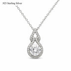 Gorgeous moissanite pendant necklace with sparkling gemstone on silver chain, elegant jewelry by Republic Mercantile