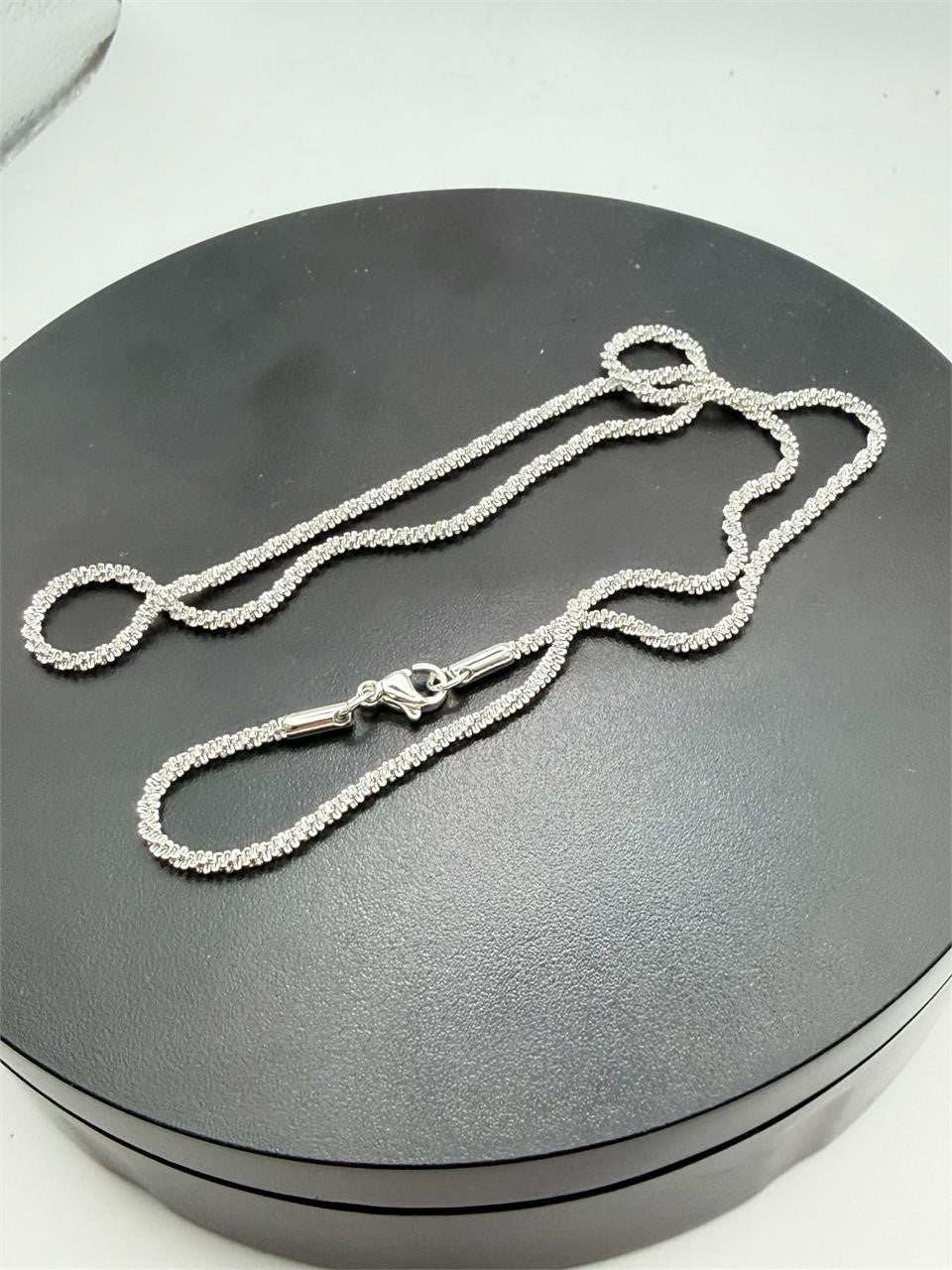 Silver textured chain necklace, 20 inches long, with a classic style from Republic Mercantile, shown in a close-up shot.
