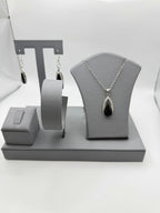 Black Onyx teardrop fashion necklace and earrings set featuring sleek black gemstones and silver-tone metal from Republic Mercantile.
