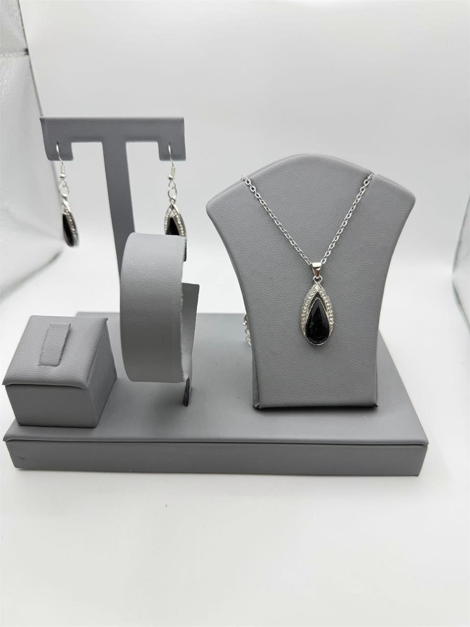 Black Onyx teardrop fashion necklace and earrings set featuring sleek black gemstones and silver-tone metal from Republic Mercantile.