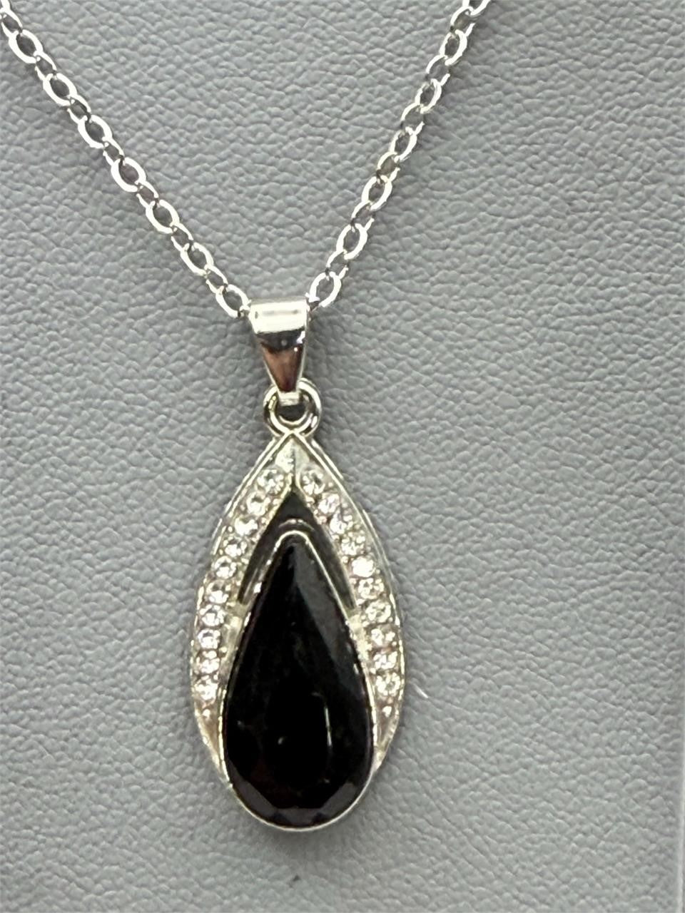 Black onyx teardrop necklace and earrings set featuring polished black stones with silver-toned findings, stylish jewelry by Republic Mercantile.