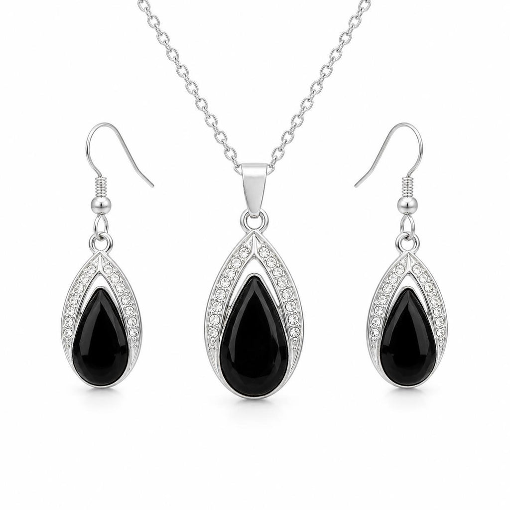 Black onyx teardrop necklace and earring set featuring polished black stones from Republic Mercantile.