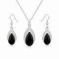 Black onyx teardrop necklace and earring set featuring polished black stones from Republic Mercantile.