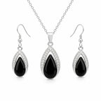 Black onyx teardrop necklace and earring set featuring polished black stones from Republic Mercantile.