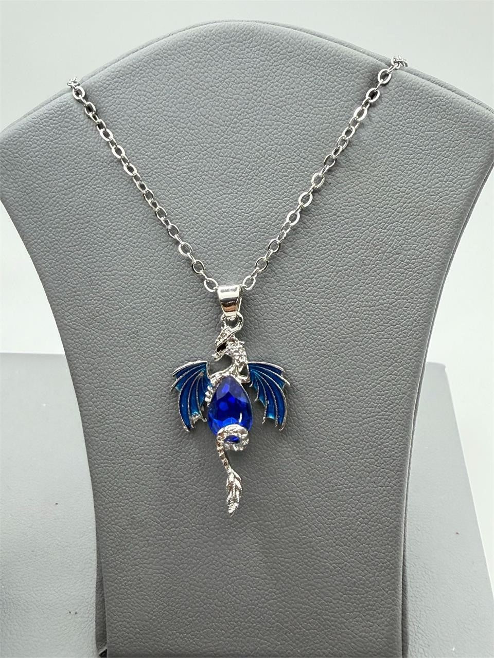 Blue dragon crystal pendant necklace, 18-inch chain, crafted by Republic Mercantile featuring a vibrant blue dragon-shaped crystal.