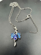Blue dragon crystal pendant necklace, 18-inch chain, featuring a detailed dragon design, by Republic Mercantile.