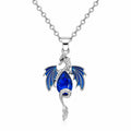 Blue dragon crystal pendant necklace, 18-inch chain, Republic Mercantile jewelry featuring a detailed dragon design.
