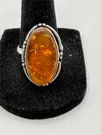 Sterling silver gemstone ring in size 9.5 with a polished band, featuring a vibrant gemstone setting, by Republic Mercantile.