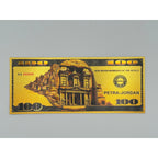 Set of seven gold foiled novelty notes featuring the 7 Wonders of the World by Republic Mercantile, displayed in a neat arrangement.