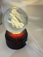 Etched crystal ball with LED lighting on a rotating stand, decorative desk accessory by Republic Mercantile.