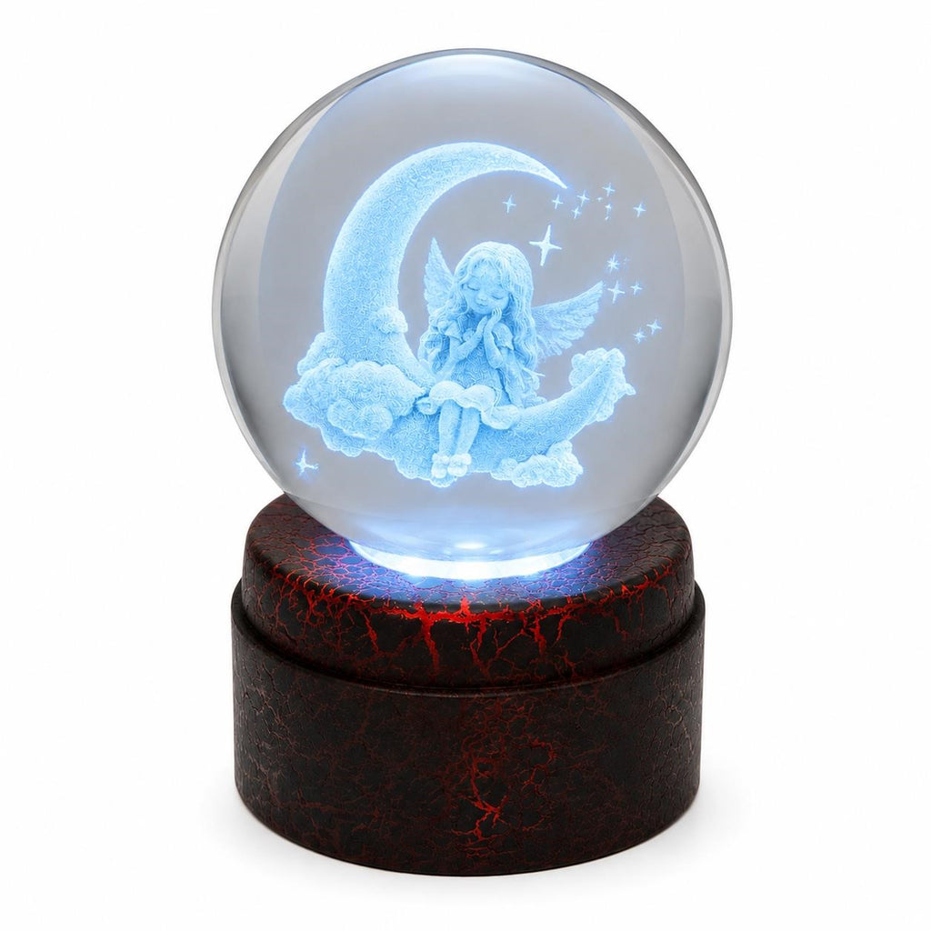 Etched crystal ball with LED lighting on a rotating stand, displayed by Republic Mercantile, showcasing intricate designs and illumination.