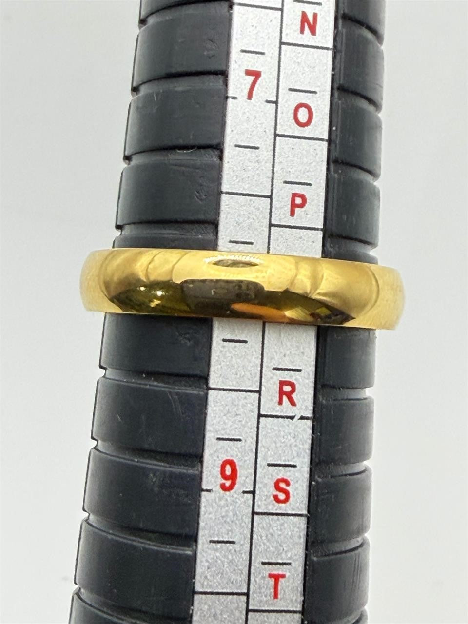 Stainless steel gold tone band ring in size 8 with a sleek, polished finish, designed by Republic Mercantile.