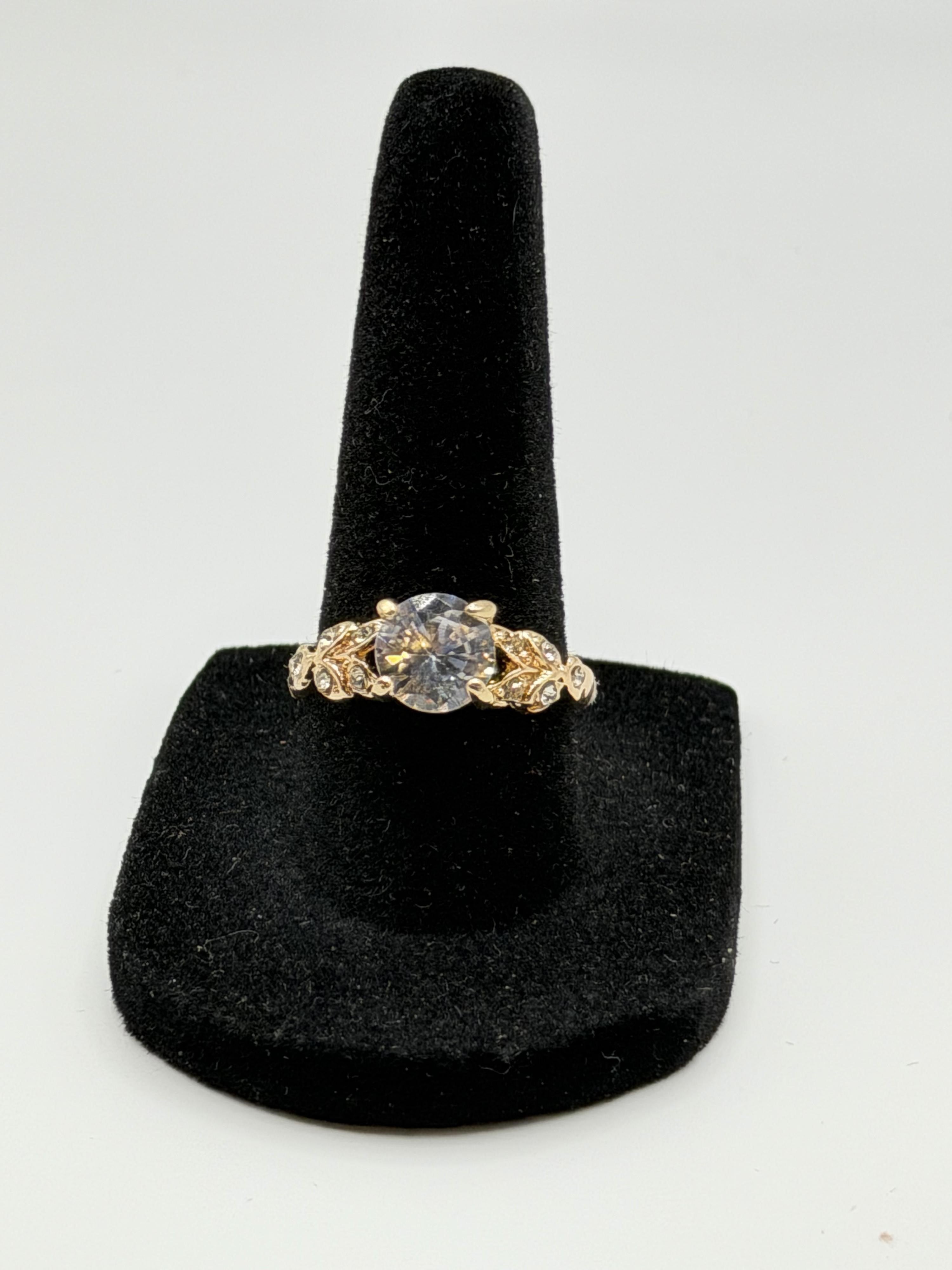 Gold tone fashion ring with cubic zirconia stone in size 8, stylish jewelry by Republic Mercantile.
