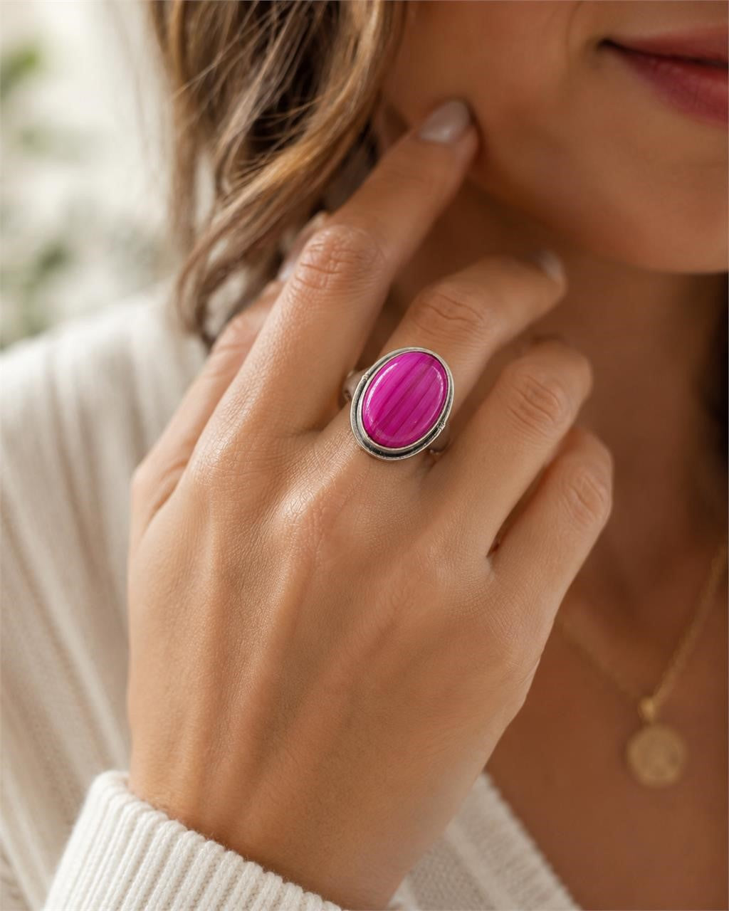 Sterling silver pink dyed oval agate stone ring in size 9.5 featuring a polished, vibrant pink gemstone setting.