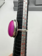 Sterling silver pink dyed oval agate stone ring in size 9.5 with polished finish, crafted by Republic Mercantile.