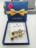 Set of three gold-plated earrings from Republic Mercantile, featuring different styles in this elegant jewelry collection.