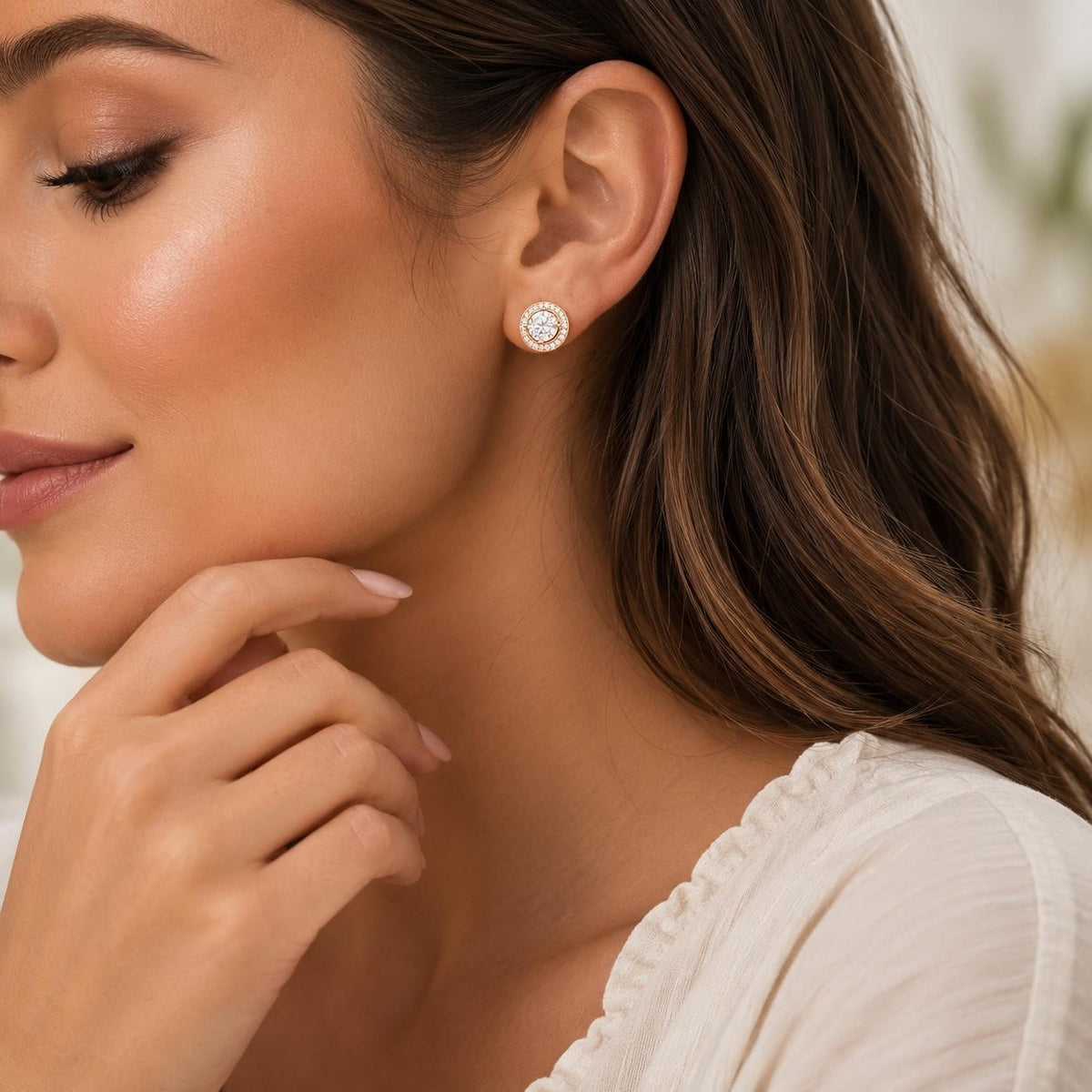 Cate & Chloé rose gold and moissanite earrings featuring sparkling gemstone accents and elegant design.