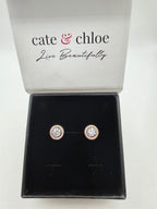 Cate & Chloé rose gold earrings with sparkling moissanite stones, elegant jewelry design on a white background.