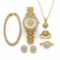 Gold tone jewelry set including watch, bracelet, ring, necklace, and earrings from Republic Mercantile displayed together.