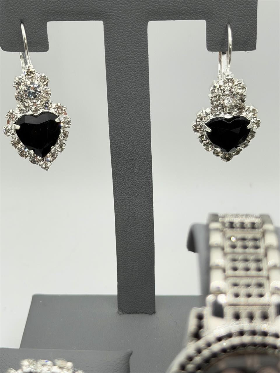 Set of five matching jewelry pieces including watch, ring, necklace, and earrings from Republic Mercantile, displayed together.