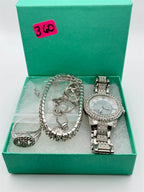 Six-piece matching jewelry set including watch, bracelet, ring, and necklace by Republic Mercantile displayed together in an elegant arrangement.