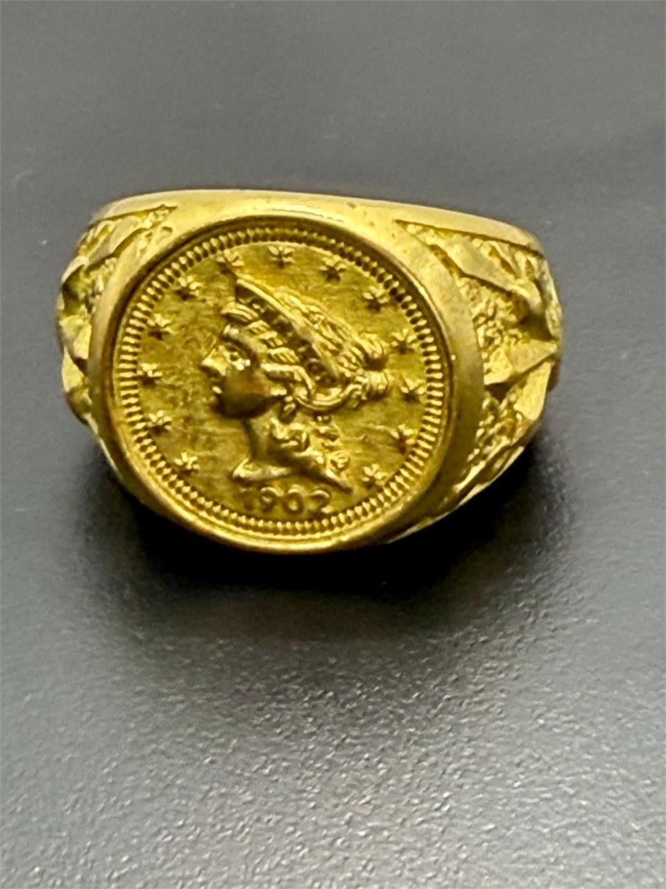 Men's gold tone coin ring with 1902 design, size 11, from Republic Mercantile, showcasing intricate vintage detailing.