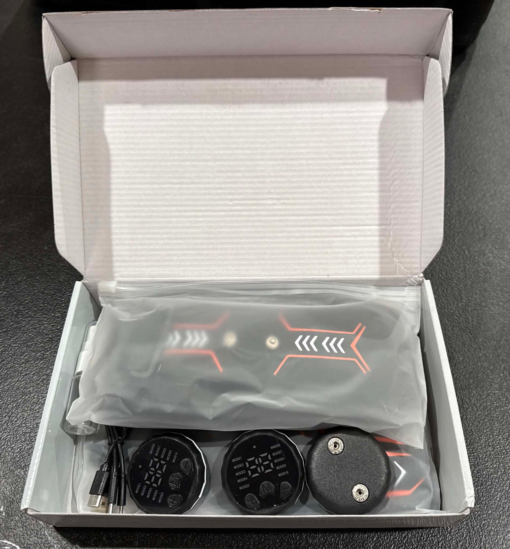 Electric muscle stimulator for fat burning and muscle massage by Republic Mercantile, showing device with electrode pads on skin.