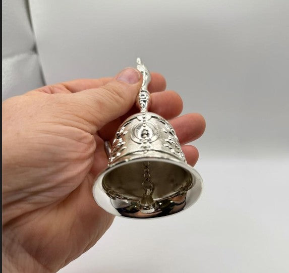 Silver Bell collectible from Republic Mercantile with a shiny, detailed bell design on a plain background.